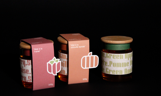 3 honey jars, 2 with labels, one without